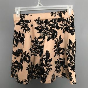beige skirt with black floral print